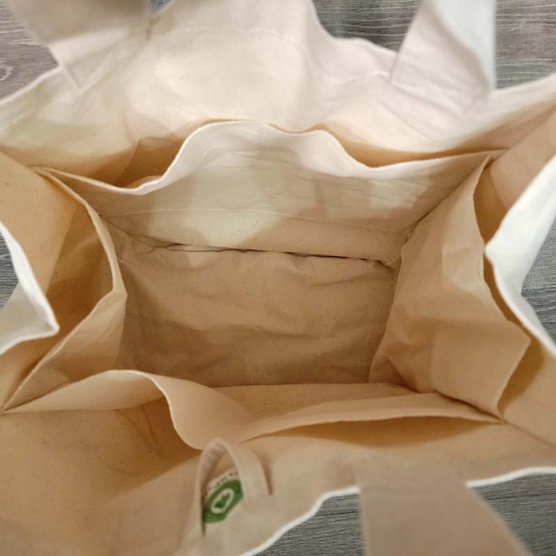 empty organic cotton canvas market bags, top view, showing six divider sleeves