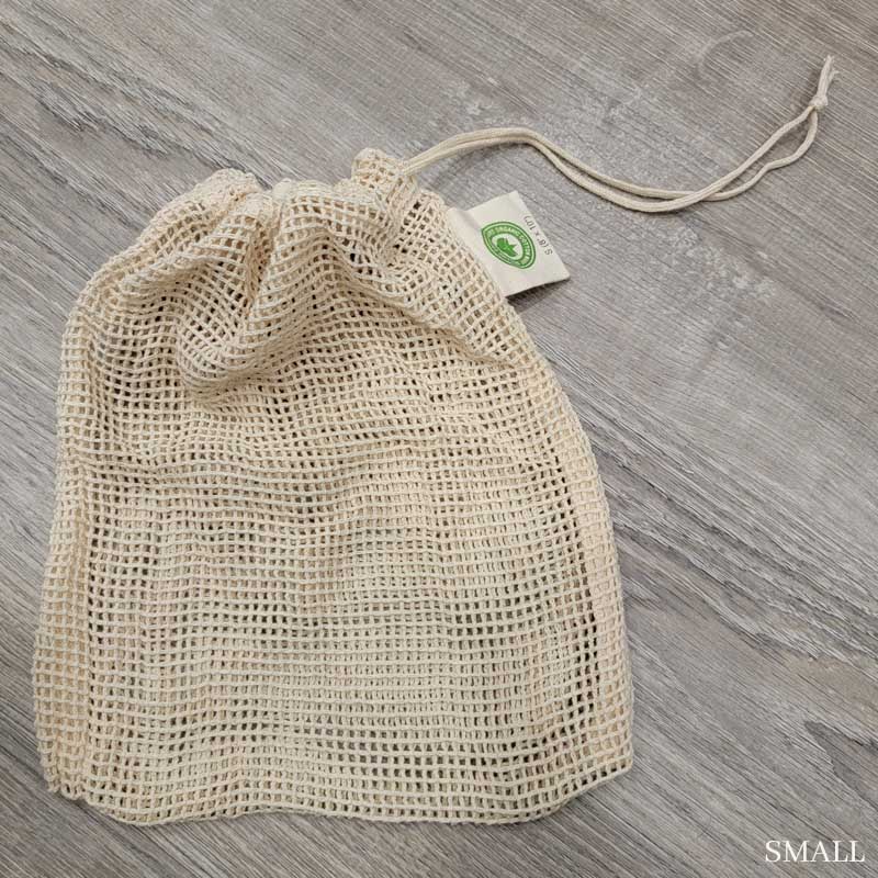 Small 100% Organic Cotton mesh produce bag on a gray wood backdrop