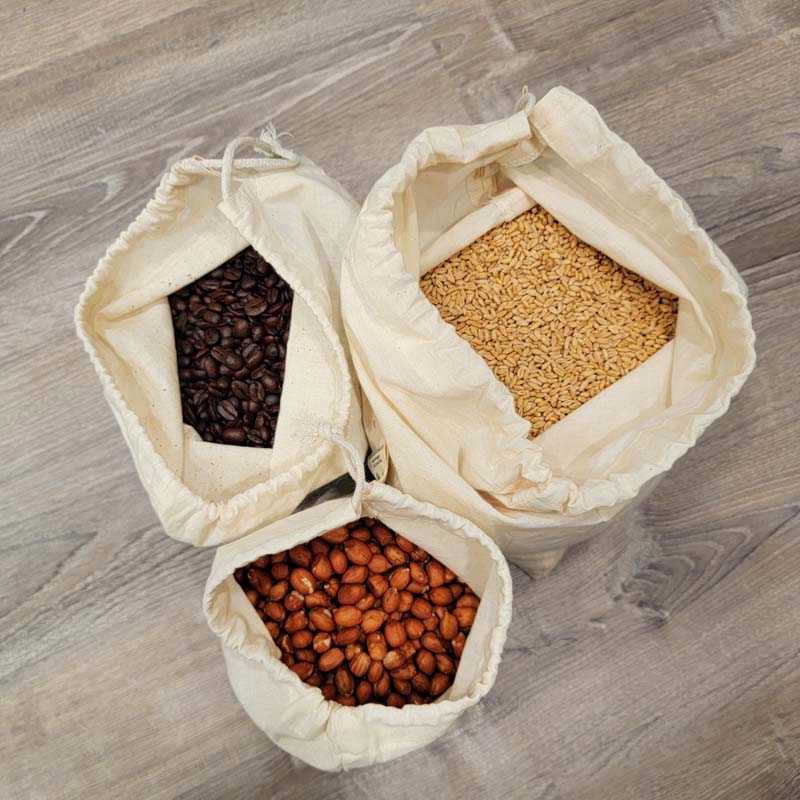 top view of muslin mesh bags filled with coffee beans, rice, and nuts