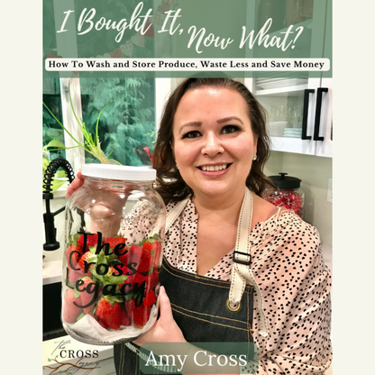 i-bought-it-now-what-ebook-cover-amy-cross-holding-a-gallon-size-mason-jar-with-fresh-strawberries-in-her-kitchen