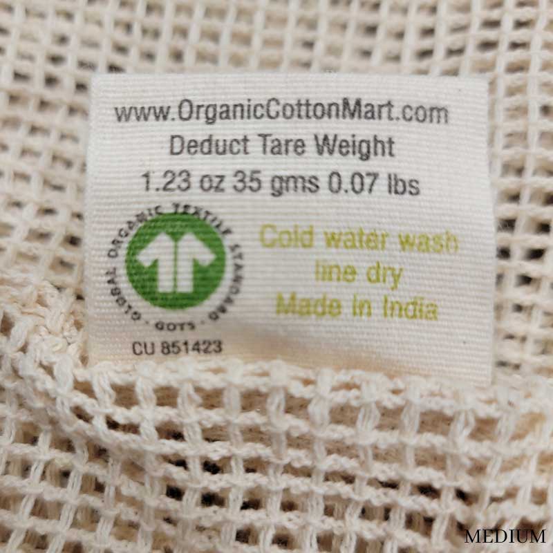 medium mesh produce bag back of tag showing tare weight of 1.23 oz.