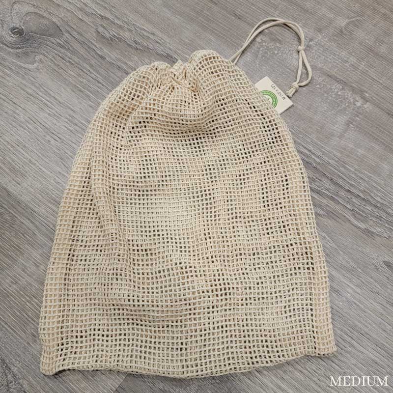 medium mesh produce bag with the top cinched closed