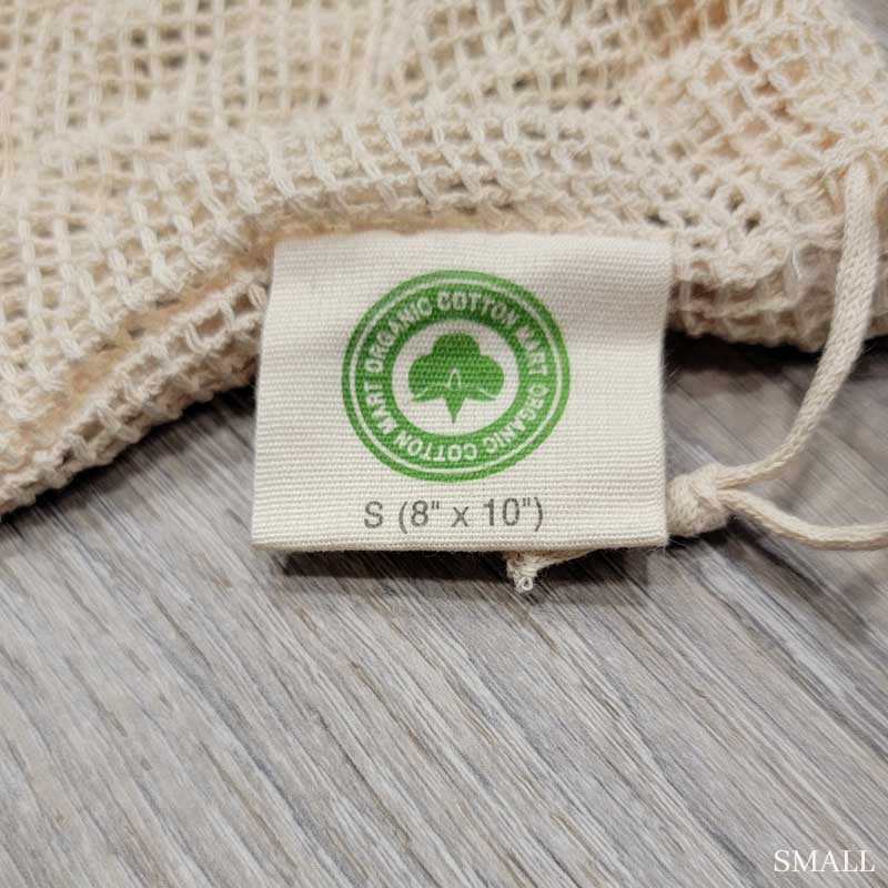 Close up of the small 100% Organic Cotton mesh produce bag  size tag showing 8" x 10"