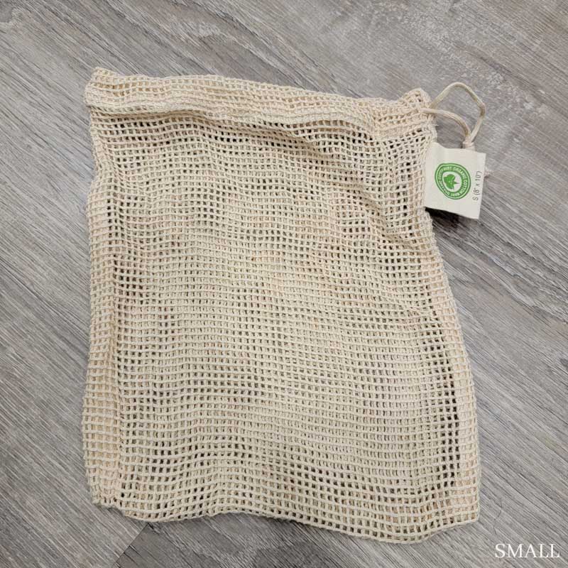 Small 100% Organic Cotton mesh produce bag on a gray wood backdrop